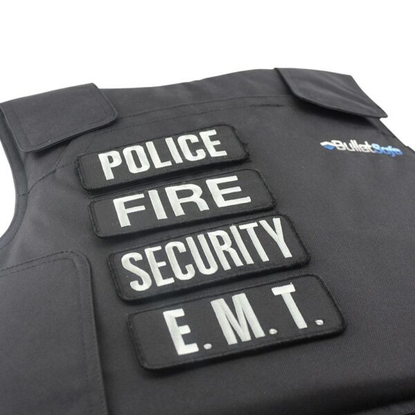 Four patches placed on a bulletproof vest
