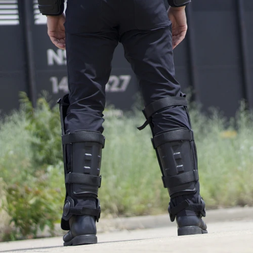 man standing outdoors while wearing bulletproof leg pads