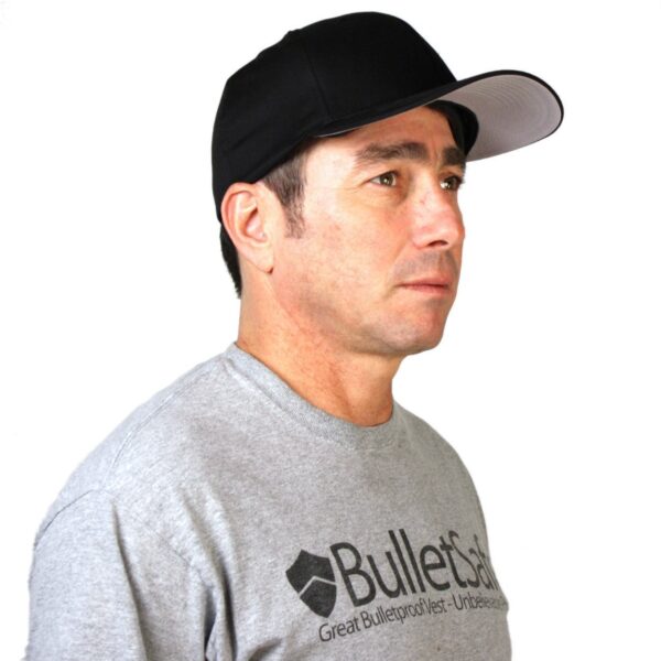 A man wearing a bulletproof baseball cap