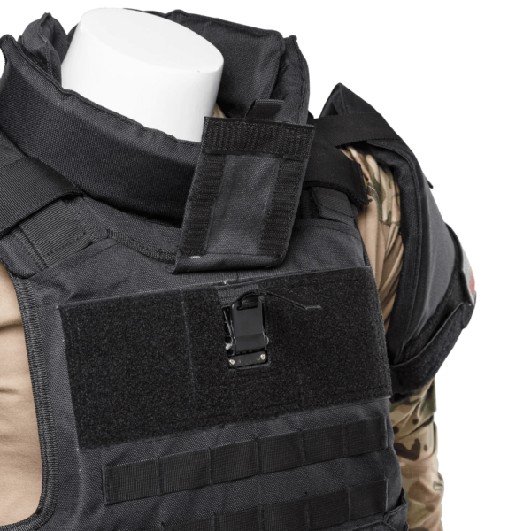 Khaki and black Raid Boss Special Full Body Armor Suit with Chest, Shoulder, Leg, Groin, and Neck Armor close up view on chest on a mannequin
