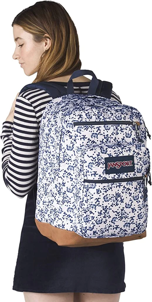 Girl wearing White field floral JanSport Bulletproof Backpack side view
