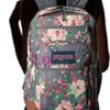Grey bouquet JanSport Bulletproof Backpack with illustration on how it fits the back of a girl