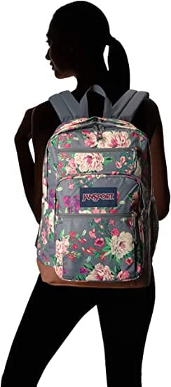 Grey bouquet JanSport Bulletproof Backpack with illustration on how it fits the back of a girl