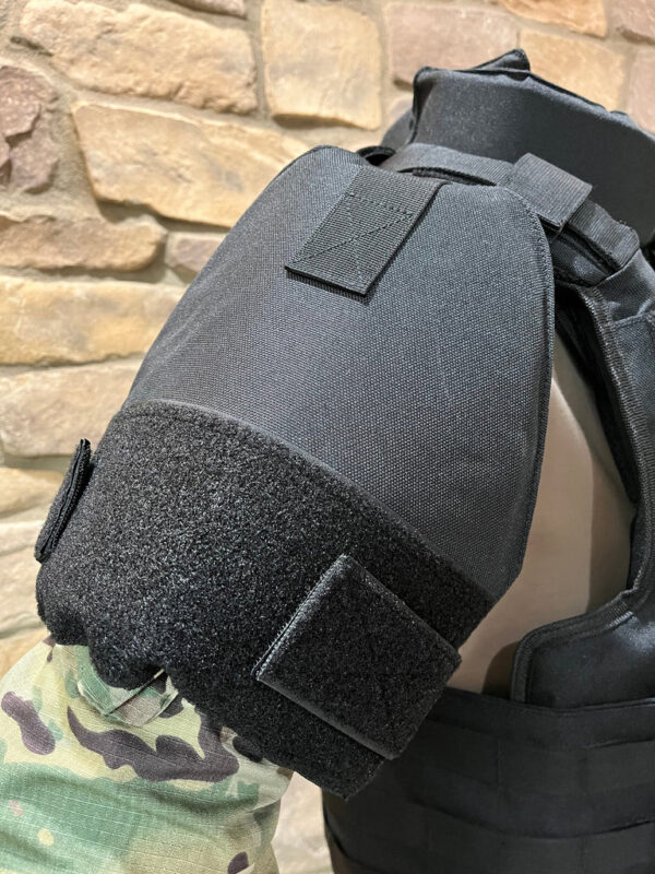 Black Raid Boss Special Full Body Armor Suit with Chest, Shoulder, Leg, Groin, and Neck Armor arm close up view on a mannequin