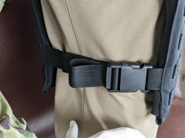 Black Armor Plate Carrier Vest with Level 3A, 3, or 4 Armor Plates side strap view on a mannequin