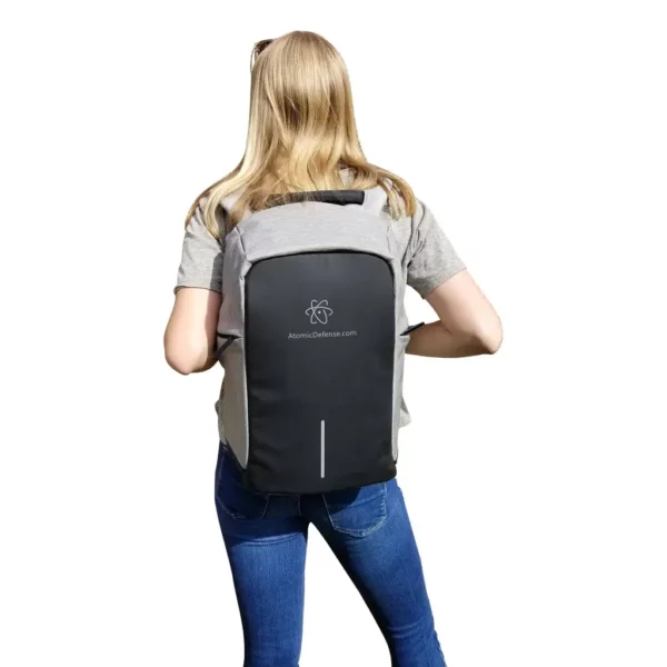 Woman wearing an AR-15 & AK-47 Protection Lightweight Bulletproof Backpack back view