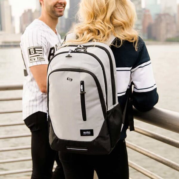 Woman wearing a Bulletproof Solo New York Varsity Region Backpack