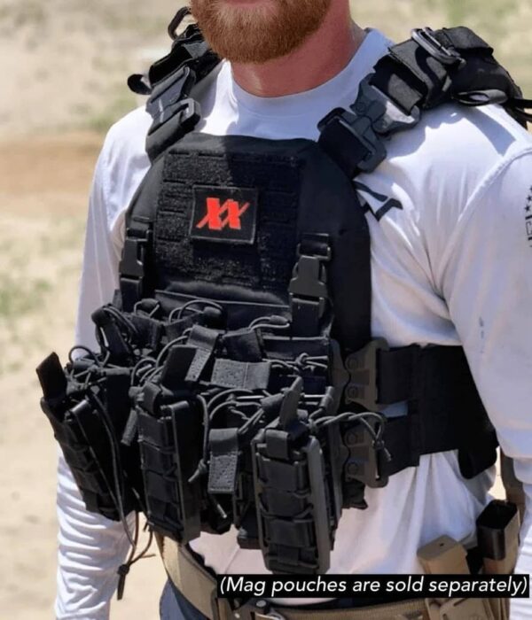 Man wearing black Real World Tactical Special Edition Shadow Plate Carrier front view