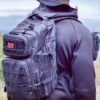 Man wearing Black Armored Backpack Tactical Assault Bag + Level IIIA Armor Panel side view