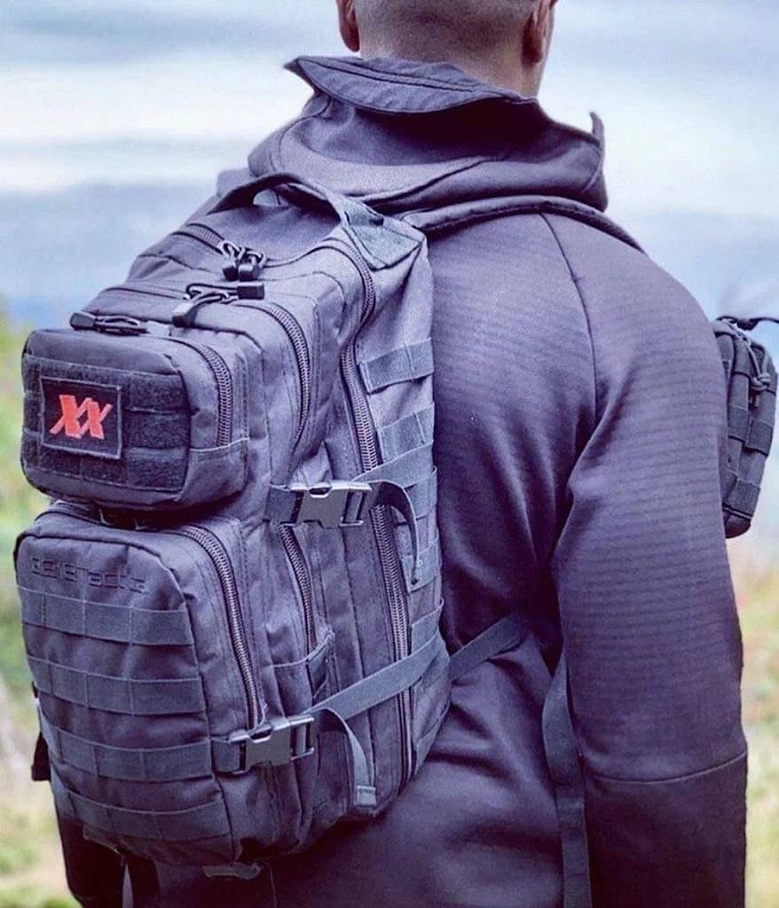 Man wearing Black Armored Backpack Tactical Assault Bag + Level IIIA Armor Panel side view