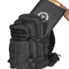 Man pulling an item inside Black Ultimate Assault Pack