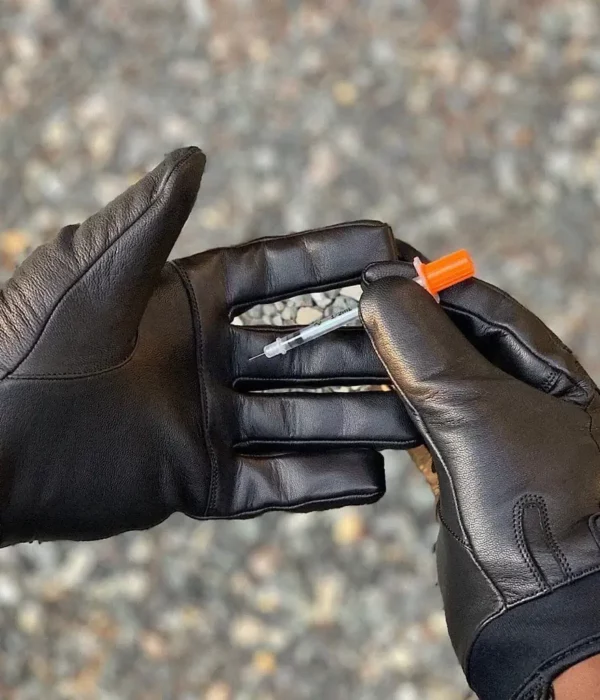 Demo injection of man wearing black Needle Resistant and Touch Screen Capable Hero Gloves 2.0 SL