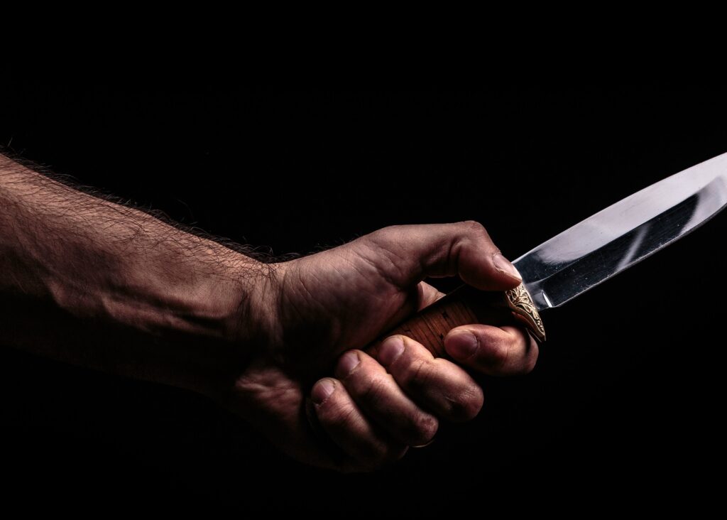 person holding a knife